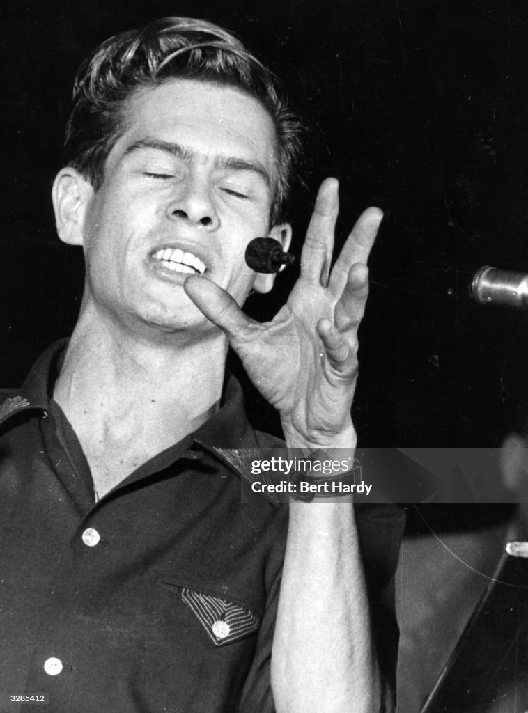 Johnnie Ray , the pop singer, rehearses for his show at the London ...