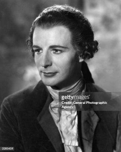 Patrick Waddington a British character actor, in a scene from the film 'I Give My Heart', adapted from the operetta success 'The Dubarry' and...