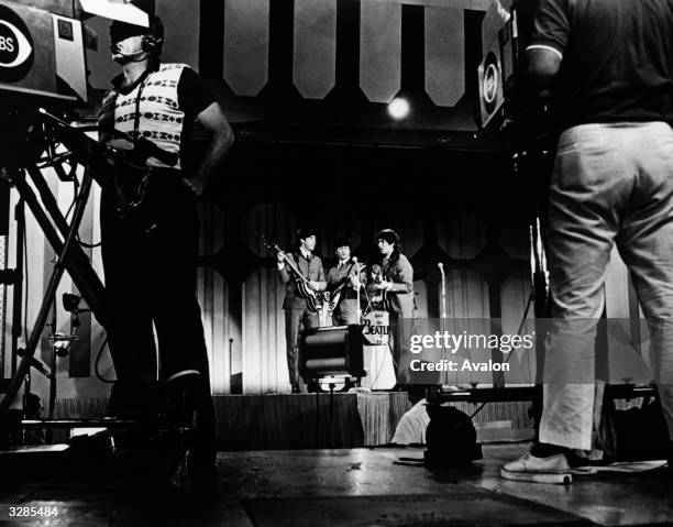 The Beatles performing live on the 'Ed Sullivan Show' from Miami Beach to a record television audience of over 50 million, Miami, Florida, February...