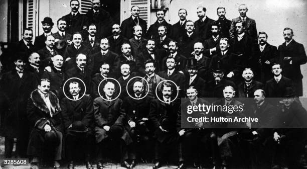 The International Film Congress in Paris. Those circled from left to right are dignitaries in the profession, namely Charles Pathe, George Eastman ,...