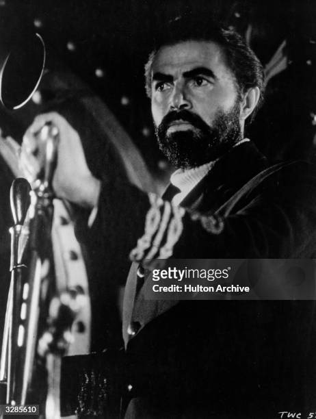 James Mason , in a scene from the film '20,000 Leagues Under The Sea', adapted from the novel by Jules Verne. The film was directed by Richard...