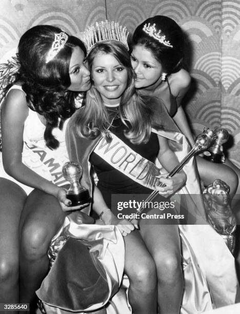 Year-old Marjorie Wallace, Miss USA, after being crowned Miss World at the Royal Albert Hall, London, England. Left is Miss Jamaica, 21-year-old...