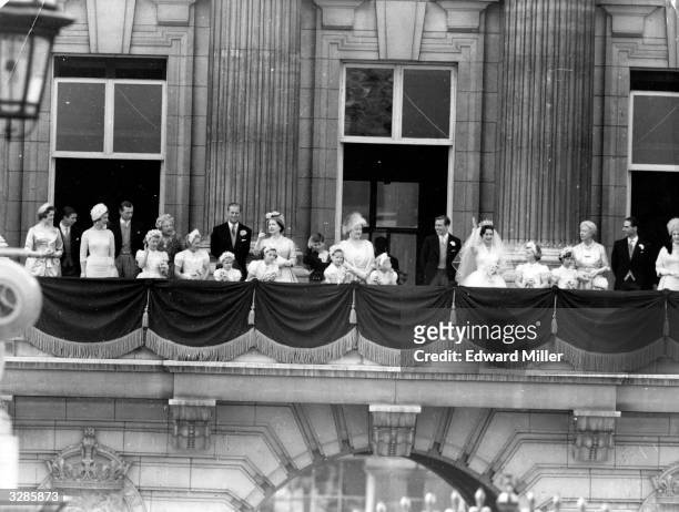 Earl Snowdon and Princess Margaret on the balcony at Buckingham Palace with members of the immediate and extended British Monarchy after their...