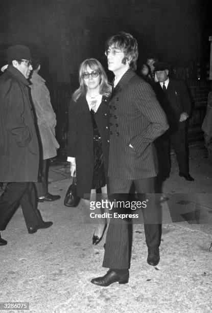 British pop musician and singer songwriter John Lennon and his wife Cynthia arriving at the memorial service of Beatles manager Brian Epstein.