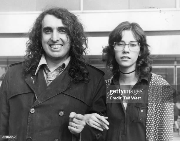 American pop singer Tiny Tim arrives at London's Heathrow Airport with his teenage wife Miss Vicki . Tim brought his famous ukelele with him for his...