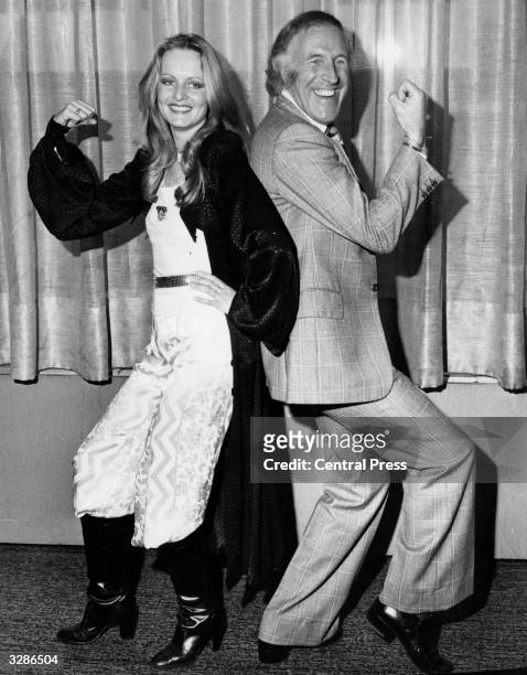 British model Twiggy with entertainer Bruce Forsyth who won the Schweppes Award for Show Business.