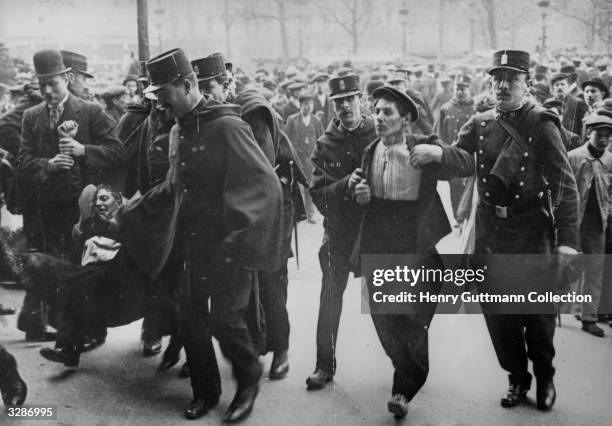 The police make arrests during the May Day demonstration in Paris.