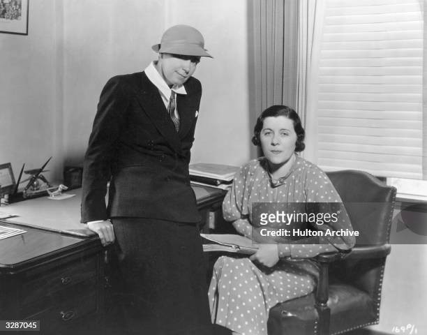 Dorothy Arzner and Sonya Levien , the film director and screen writer who are collaborating on the Fox film 'The Captive Bride'. A former editor,...