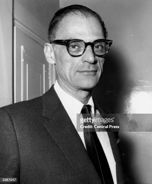 Arthur Miller, American playwright, arriving at the Old Vic to see his own play 'The Crucible'.