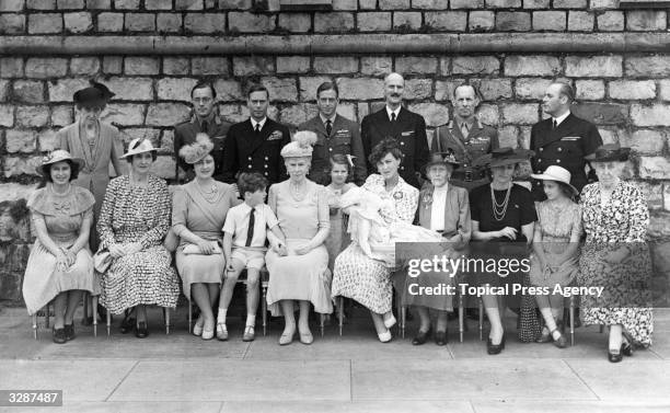 The Duke of Kent and Duchess at the christening of their son, Michael George of Kent, with King George VI Queen Elizabeth, Queen Mary, Pr Elizabeth,...