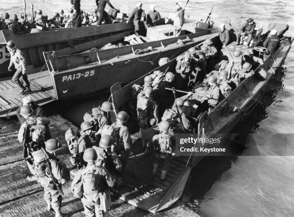 US troops board their Landing Craft Vehicle-Personnel at Torquay ...