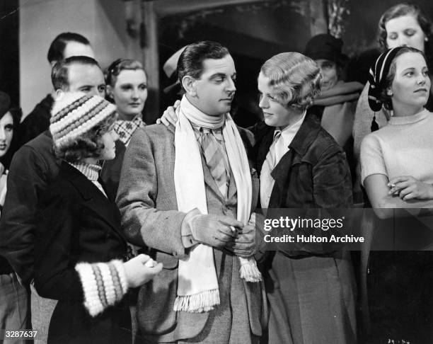 Nova Pilbeam, Leslie Banks and Edna Best in a scene from the spy thriller 'The Man Who Knew Too Much', directed by Alfred Hitchcock for Gaumont.