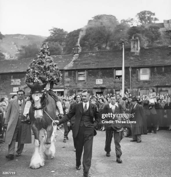 May Day festivities in the town of Castleton, during which the king is led through the streets, in accordance with ancient tradition. The day is a...