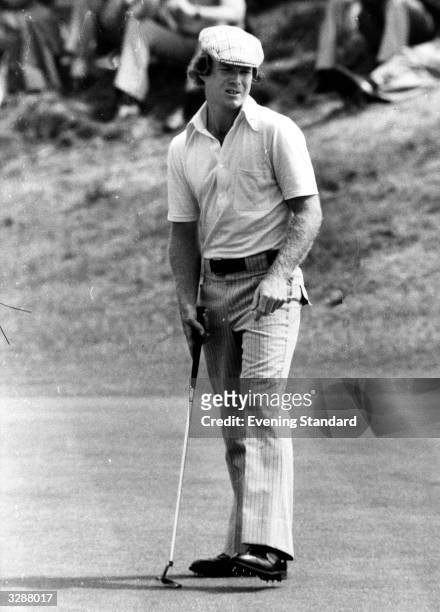 Tom Watson, American golfer, looking a little strained during play.