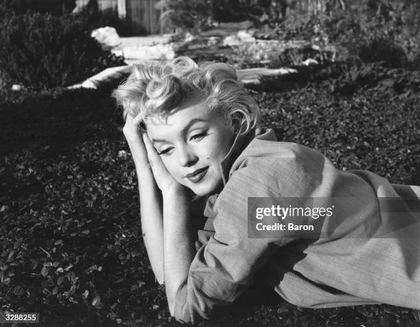 Wistful Marilyn Monroe .