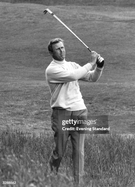 Michael Bonallack the year that he captained the Walker Cup team and was awarded the OBE, hitting from the rough.