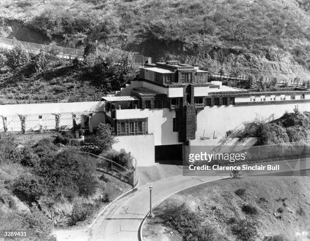 An exterior view of the home of Ramon Novarro, the Metro Goldwyn Mayer star. It is situated in the hills overlooking Los Angeles. Four stories high...