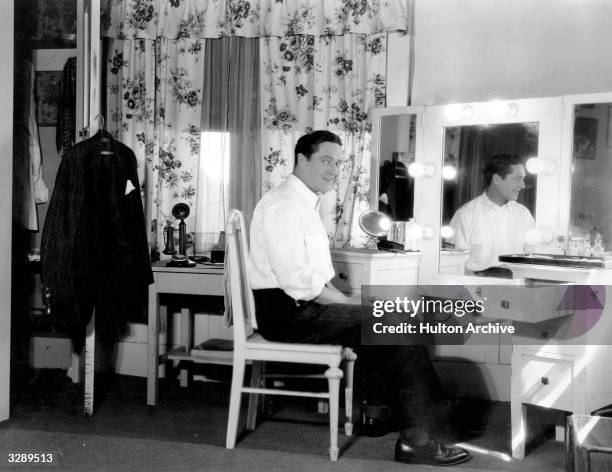 Fox Films actor Edmund Lowe in his dressing room.