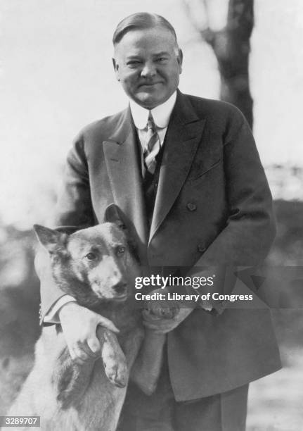 Herbert Hoover , the 31st President of the United States, with his dog.