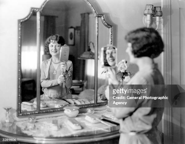 May McAvoy the American leading lady of the silent screen, who never made the successful transition to the talkies. Pictured in her dressing room,...