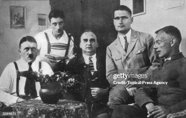 Adolf Hitler receives visitors, including Rudolf Hess , , during his imprisonment in Landsberg jail.