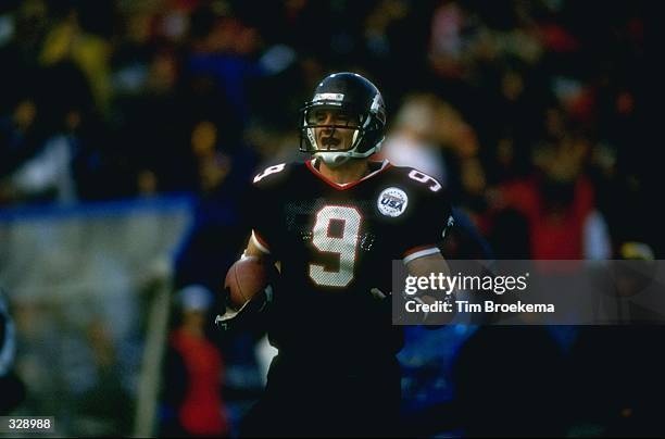 Tinker Keck of the Cincinnati Bearcats carries the ball during a game against the Louisville Cardinals at the Nippert Stadium in Cincinnati, Ohio....