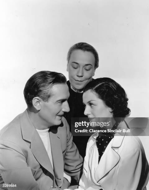 From left to right, Paul Lukas , Louise Henry and Rosalind Russell star in the detective film 'The Casino Murder Case', based on the novel by S S Van...