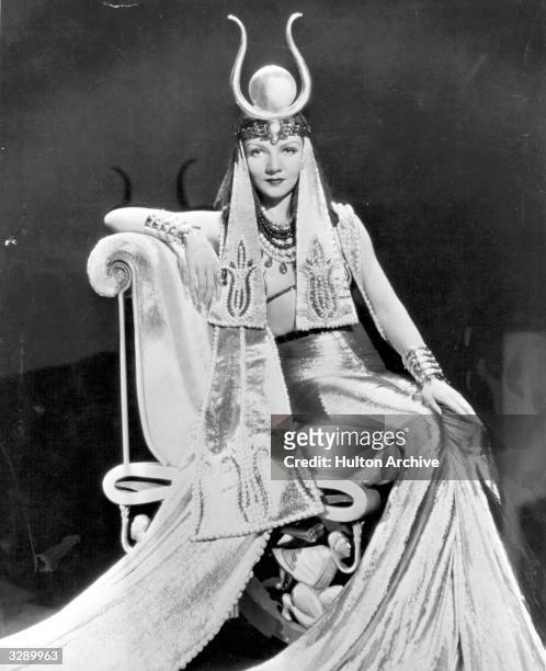 Claudette Colbert , as she appears in the title role of Cecil B DeMille's 'Cleopatra'. Costume designed by Travis Banton.