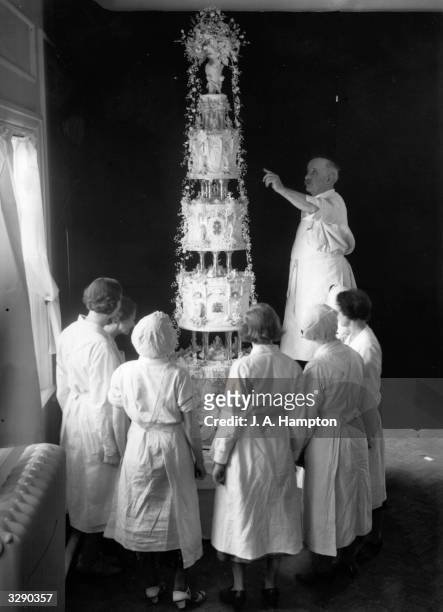 The Royal wedding cake made by Messrs McVitie & Price for the marriage of the Duke of Kent and Princess Marina of Greece. It stands at nine feet high...