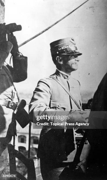 Victor Emmanuel III, , King of Italy, , watching operations from an observation post. He abdicated in May 1946.