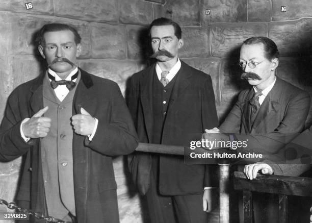 Wax models of executed murderers on display in the Chamber of Horrors attraction at Madame Tussaud's wax museum in London, circa 1935. Left to right:...