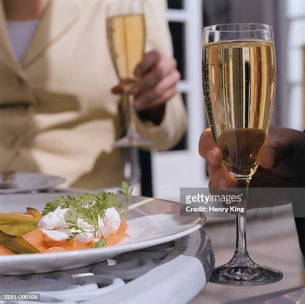 couple having lunch - cheese and champagne stock pictures, royalty-free photos & images