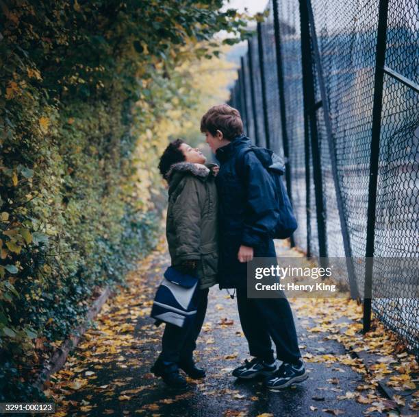 two boys fighting - aggressiv bildbanksfoton och bilder