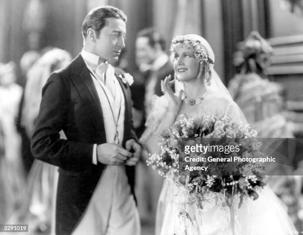 Actors Ann Harding and Clive Brook perform the wedding scene in the film 'East Lynne'. Title: East Lynne Studio: TCF Director: Frank Lloyd