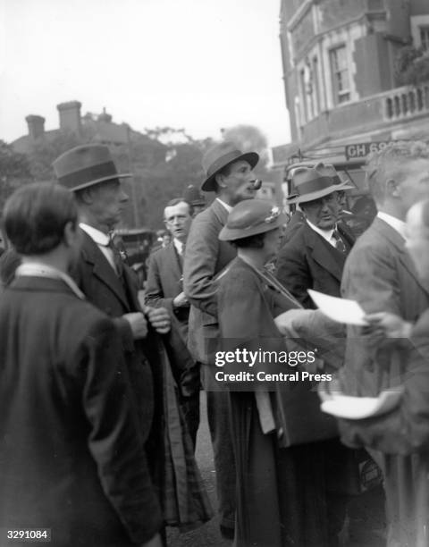 English cricketer Douglas Jardine queuing outside the Oval cricket ground in London, for a test match he is to commentate on.