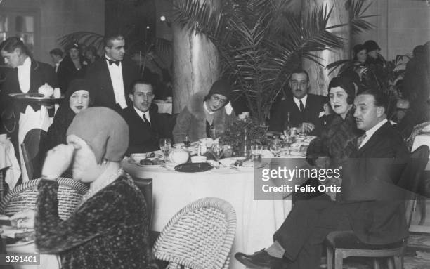 The Infante Don Jaime, , Duke of Segovia, takes tea at the Hotel Ritz in Madrid. He is attending a lottery for the benefit of the capital's poor...