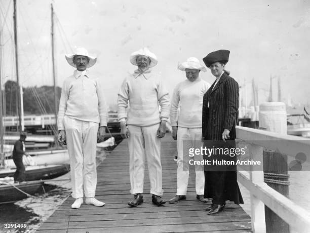 Prince Henry of Prussia , the younger brother of Kaiser Wilhelm of Germany, yachting with Mr and Mrs R Krogmann and friend at Kiel, which passed to...