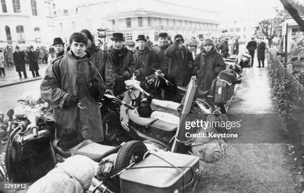 Group of Mods with their scooters in Brighton for the Bank Holiday.