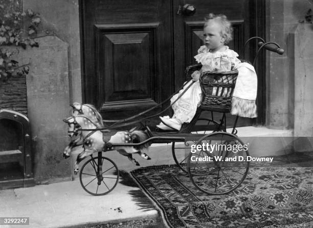 George VI playing as a young child. He ascended the throne as King of Great Britain in 1936 on the abdication of his elder brother Edward VIII.