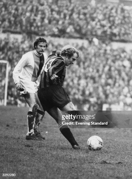 Footballer Francis Lee of Manchester City kicks the ball in the match against Crystal Palace.