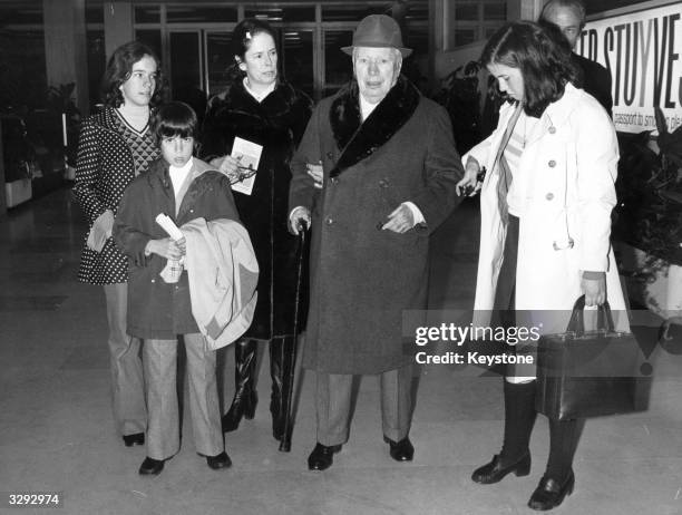 Charlie Chaplin arriving in Nice to spend the Easter holidays with his wife, Oona and his three youngest children, Annette, Christopher, and Jane.