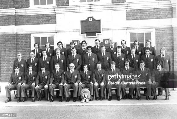 The British Lions rugby union team pose for a team photograph. Across the back row from left to right are: H E Rees, P J Squires, D B Williams, B H...