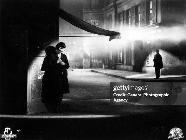 Chinese-American actress Anna May Wong , formerly Wong Liu Tsong hides in the shadows in a scene from an unknown German film.