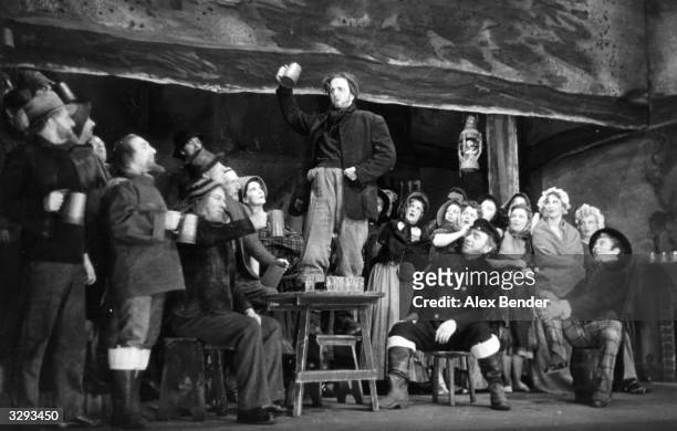 Scene from Benjamin Britten's new opera 'Peter Grimes' at the Sadler's Wells theatre in London, with tenor Peter Pears as Grimes. Original...