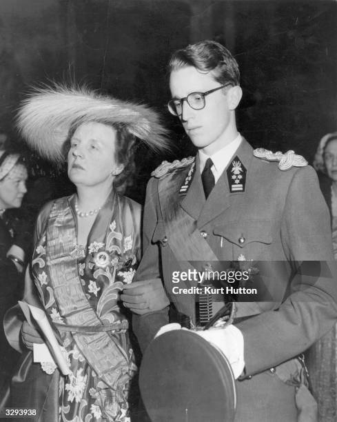 Belgian King Baudouin I, with Queen Juliana of the Netherlands, in Luxembourg Cathedral to attend the marriage of Prince Jean of Luxembourg to...
