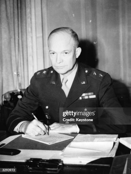General Dwight D Eisenhower,Commander-in-Chief of the Allied Forces, attends a press conference in London. Eisenhower was later elected the 34th...