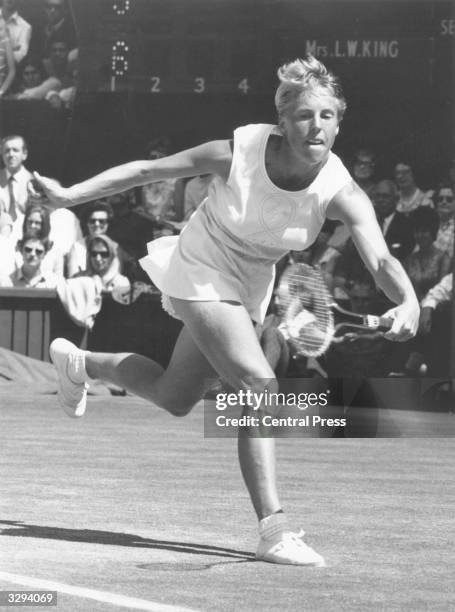 British tennis player Ann Jones on her way to beating Billie Jean King of the USA during the women's singles final at the Wimbledon Lawn Tennis...