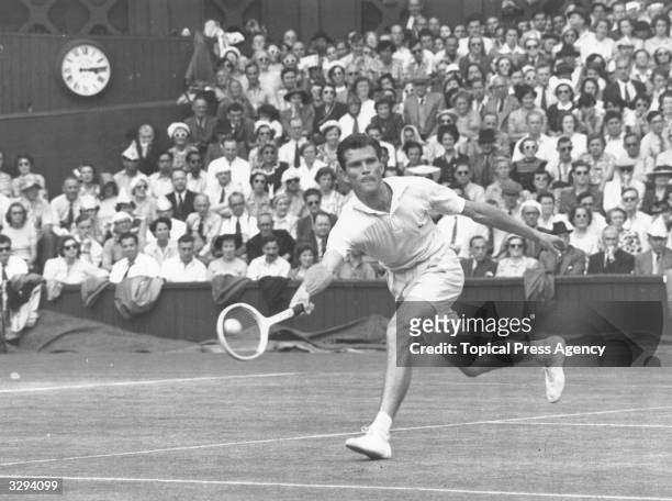 Budge Patty of the USA in action against Australia's Frank Sedgman on his way to winning the men's singles final at the Wimbledon Lawn Tennis...