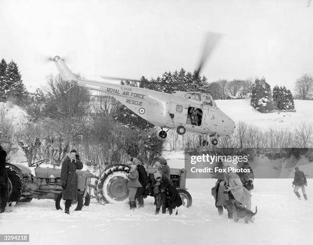 Sheep on Exmoor near Minehead no longer risk starvation following the work by the RAF air rescue Sikorsky S-55 helicopter in delivering bales of hay...