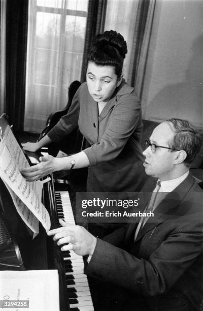 Russian soprano Galina Vishnevskaya with her husband the Russian cellist, conductor and composer Mstislav Rostropovich at the piano.